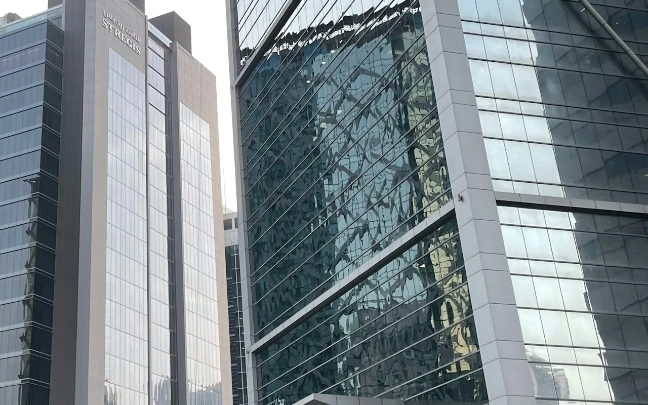 Completed hotel and office façades on Al Ohood Street in Business Bay